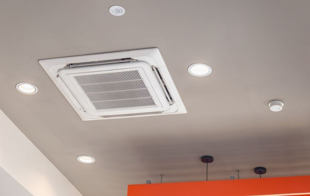 Ceiling With Recessed Lights and a White Air-conditioning Vent — Enterprise Air That's Cool In Svensson Heights, QLD