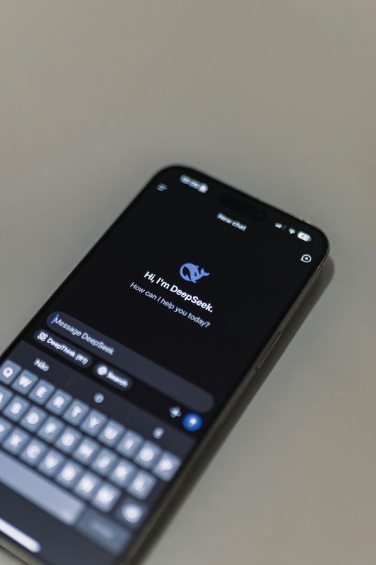 AI chatbot on mobile device handling customer interaction and support