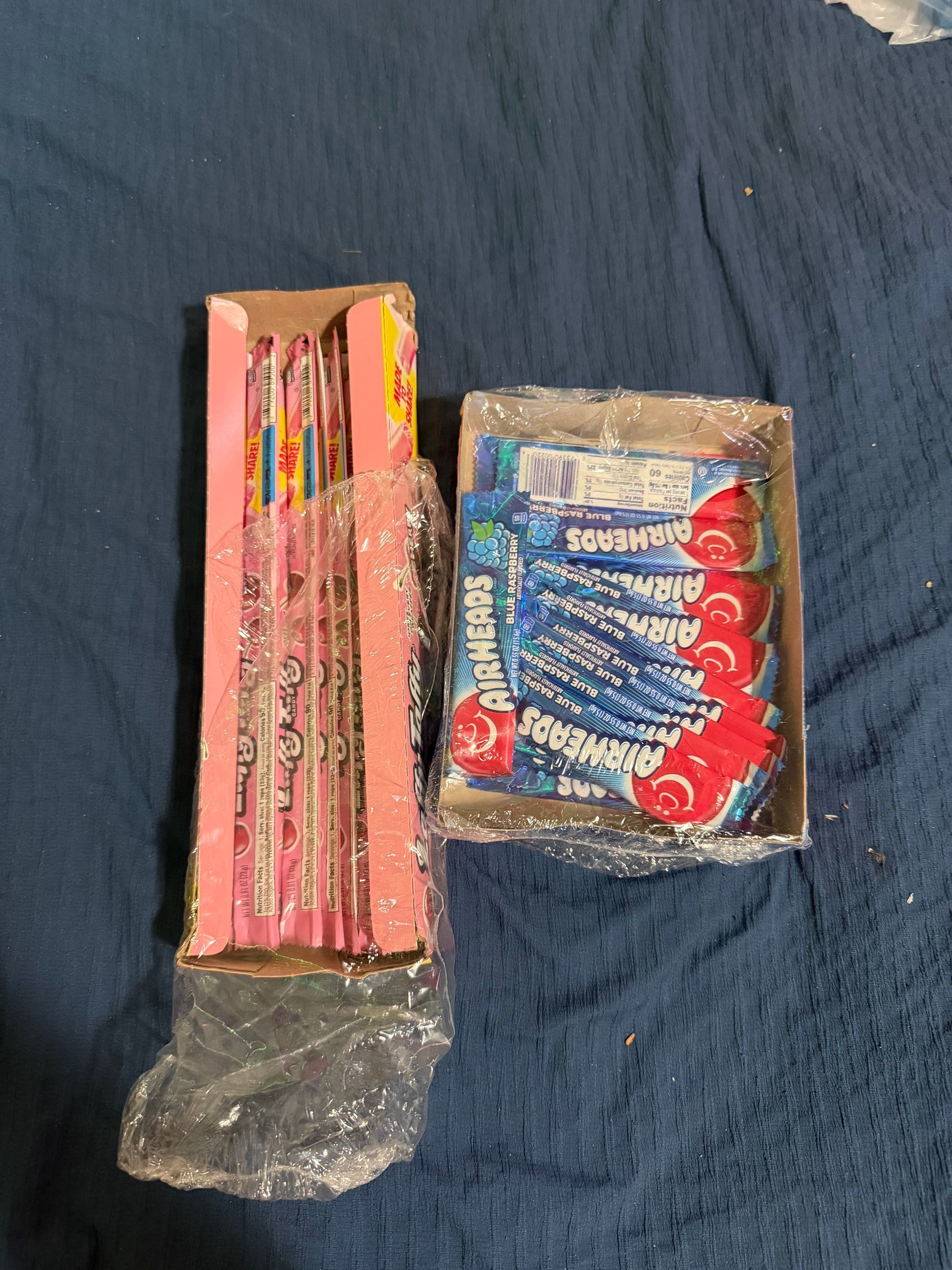 There are many different types of candy in the trays.