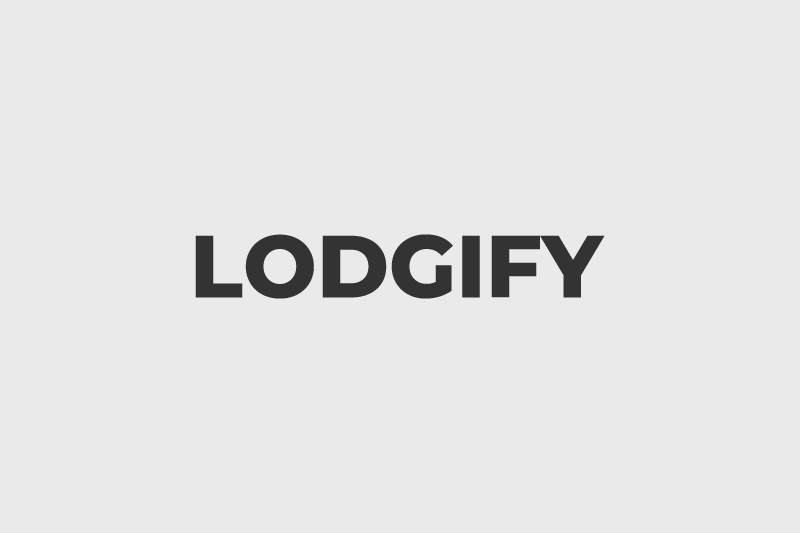 Lodgify logo in dark grey text on a light grey background.