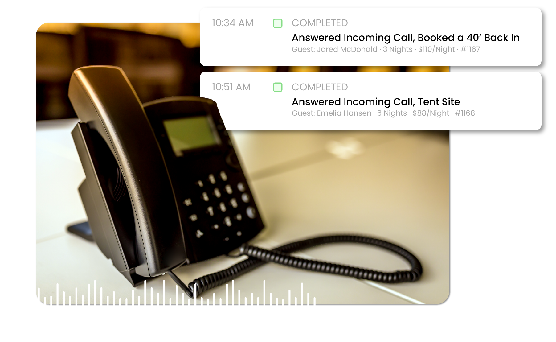 Black office desk phone with coiled cord and blurred call notifications on a warm desk background