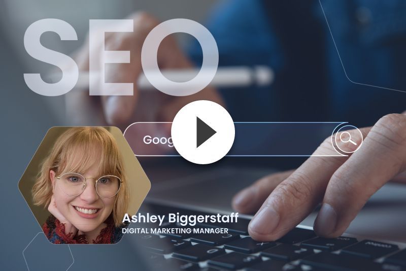 A woman is typing on a laptop with the word seo in the background