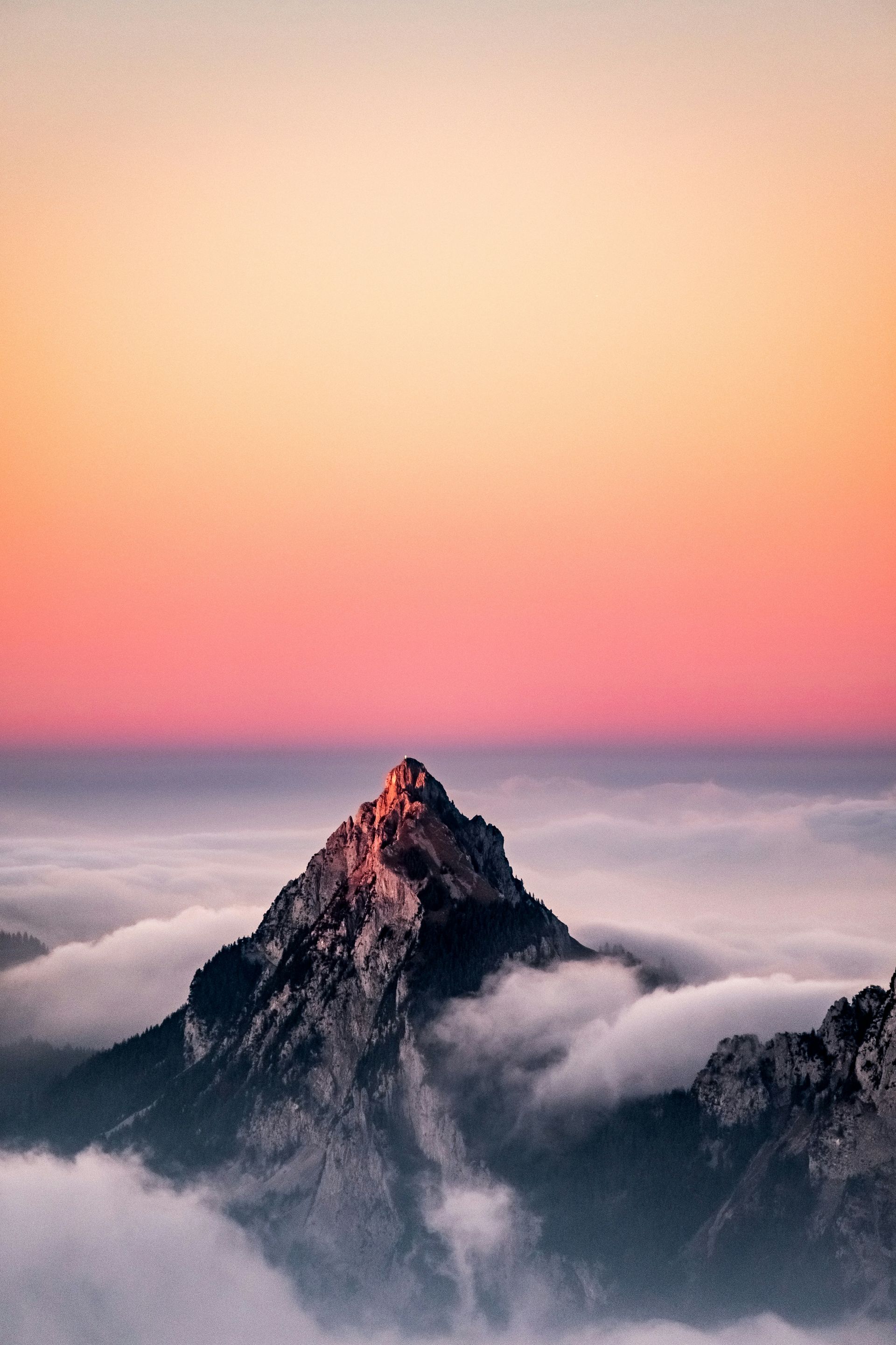 Mountain peak symbolizing overcoming challenges and personal growth in men’s counseling