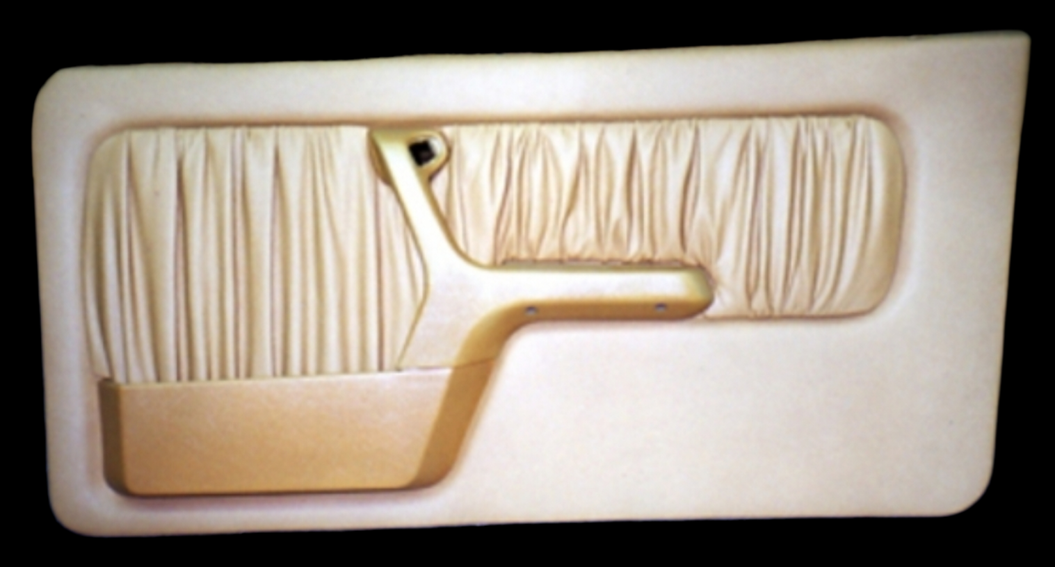 Tan car door panel with textured fabric, armrest, and door handle.