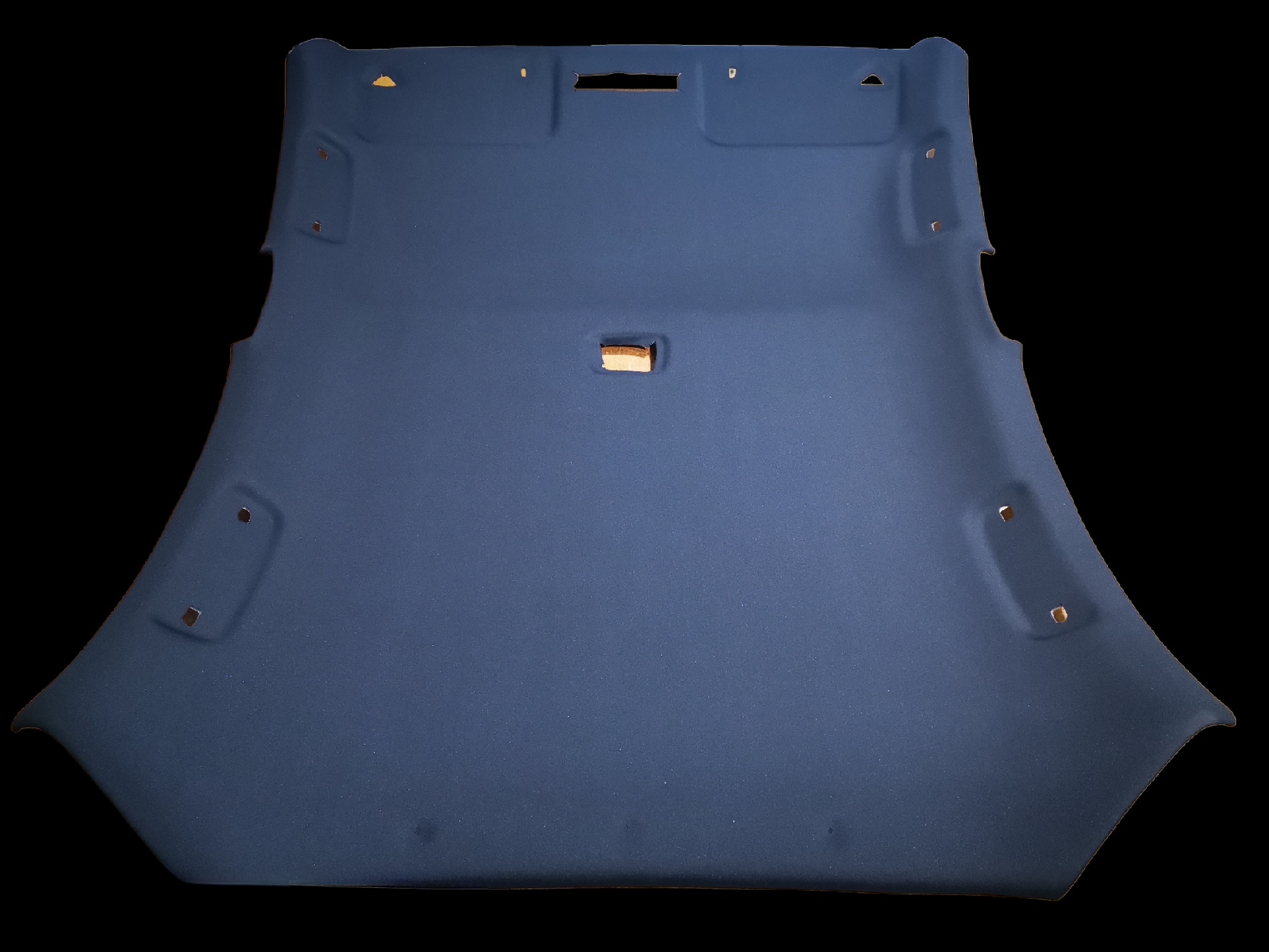 Blue car headliner on a black background, with holes for mounting and overhead light.