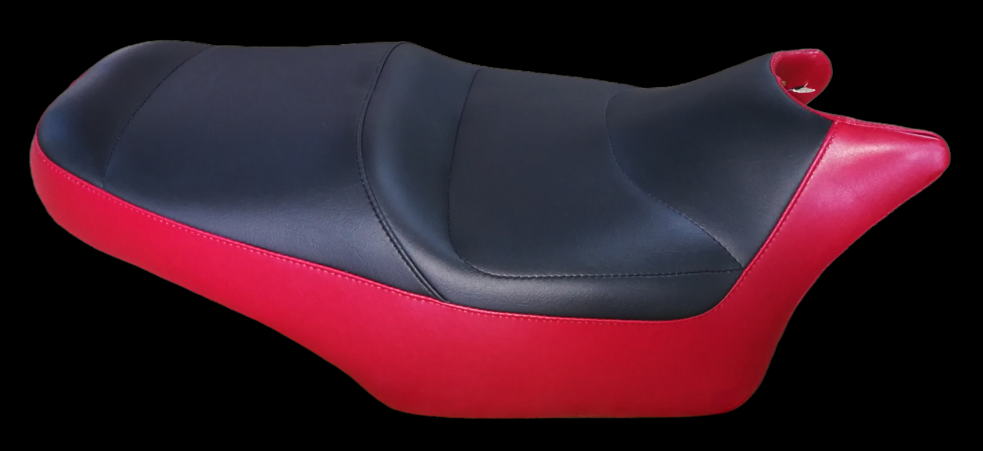 A black and red motorcycle seat with a rounded shape.