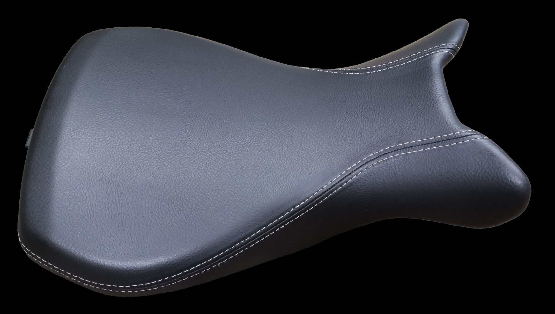 Black motorcycle seat with white stitching against a black background.