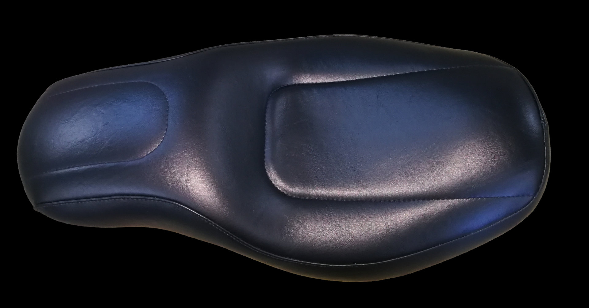 Black leather motorcycle seat with two raised sections.