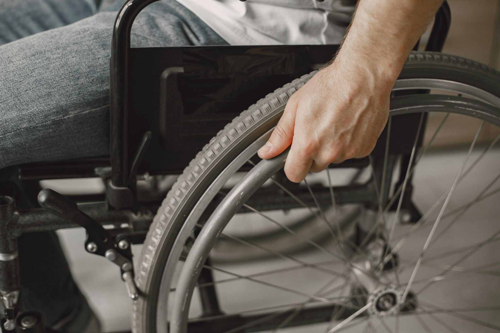 Therapist Assists a Man With Back Pain — Ballina Home Healthcare Sales & Hire and Compression Stockings Plus in Ballina, NSW