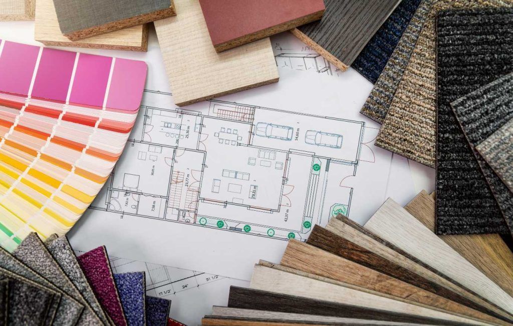 Floor plan with color swatches and material samples; design concept.