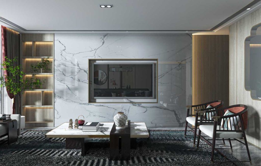 Living room with marble accent wall, built-in TV, modern furniture, and a dark patterned rug.