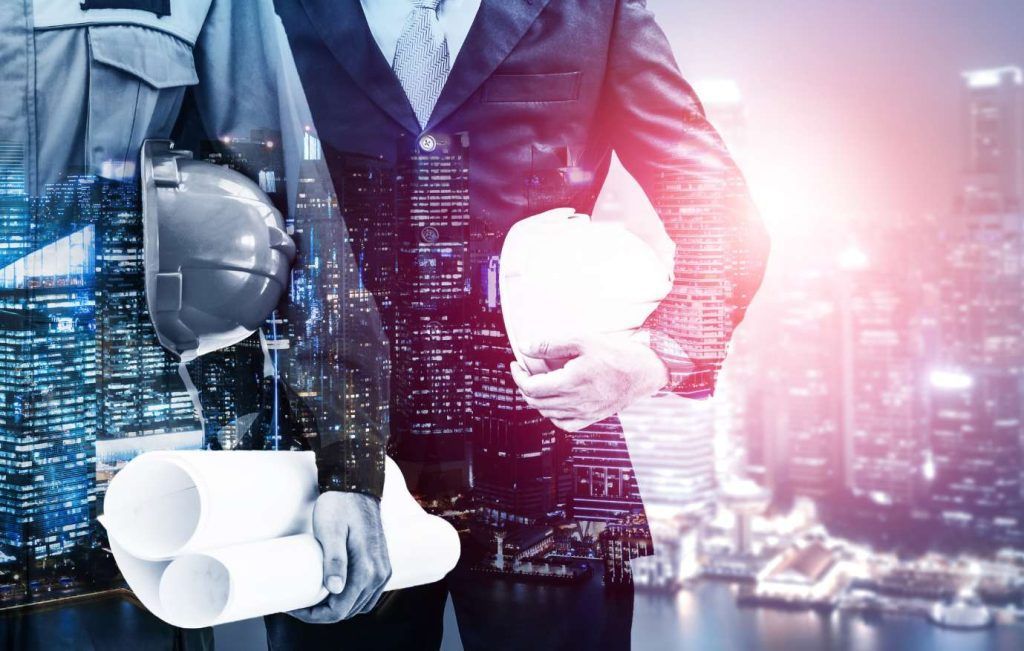 Overlay of engineer holding blueprints and hard hat, with city skyline in the background.