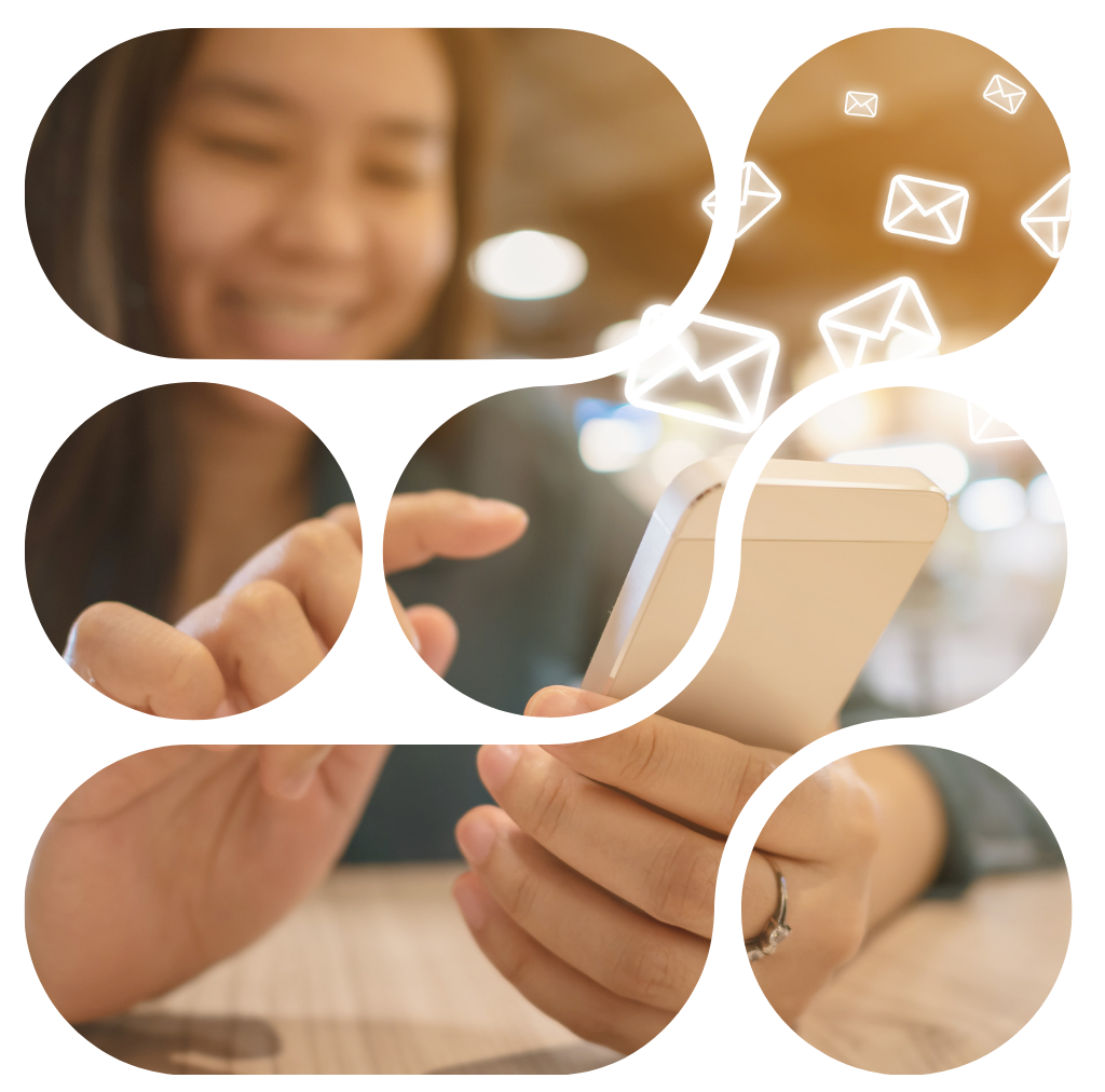 Woman smiling, using phone with email icons.