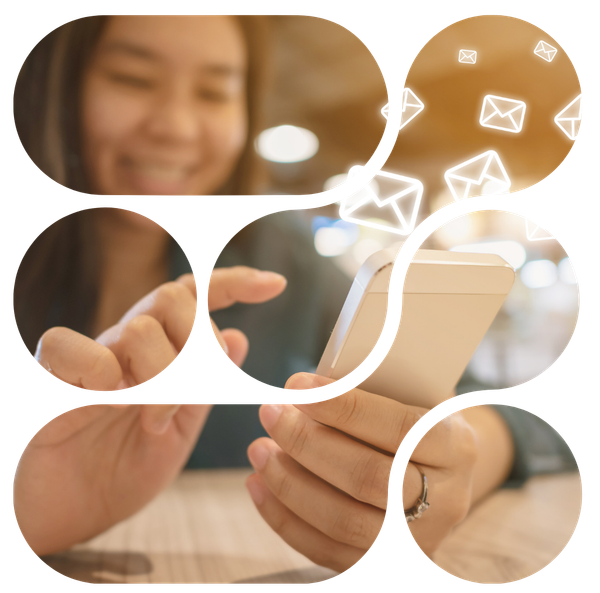 Woman smiling, using phone with email icons.