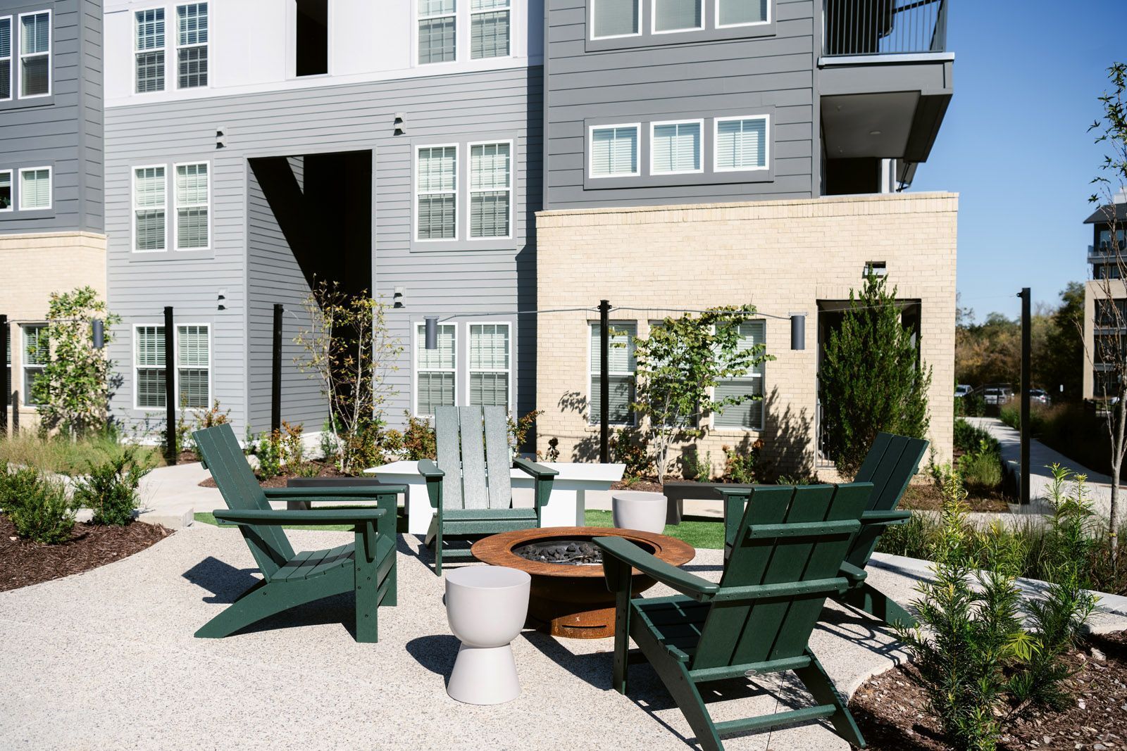 Adirondack chairs around the fire pit at Livano Nations.