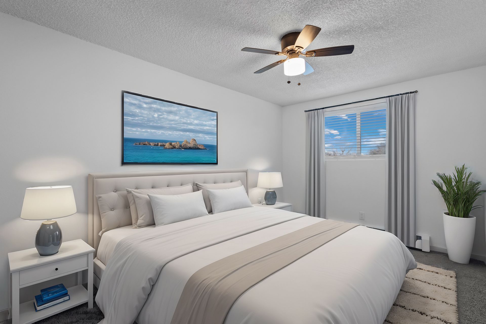 Photo of a bedroom with a ceiling fan