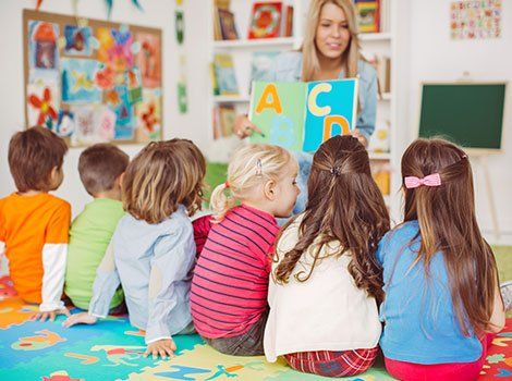 Teacher and Children — El Paso, TX — Sunshine Day Care Center Teacher and Children — El Paso, TX — Sunshine Day Care Center