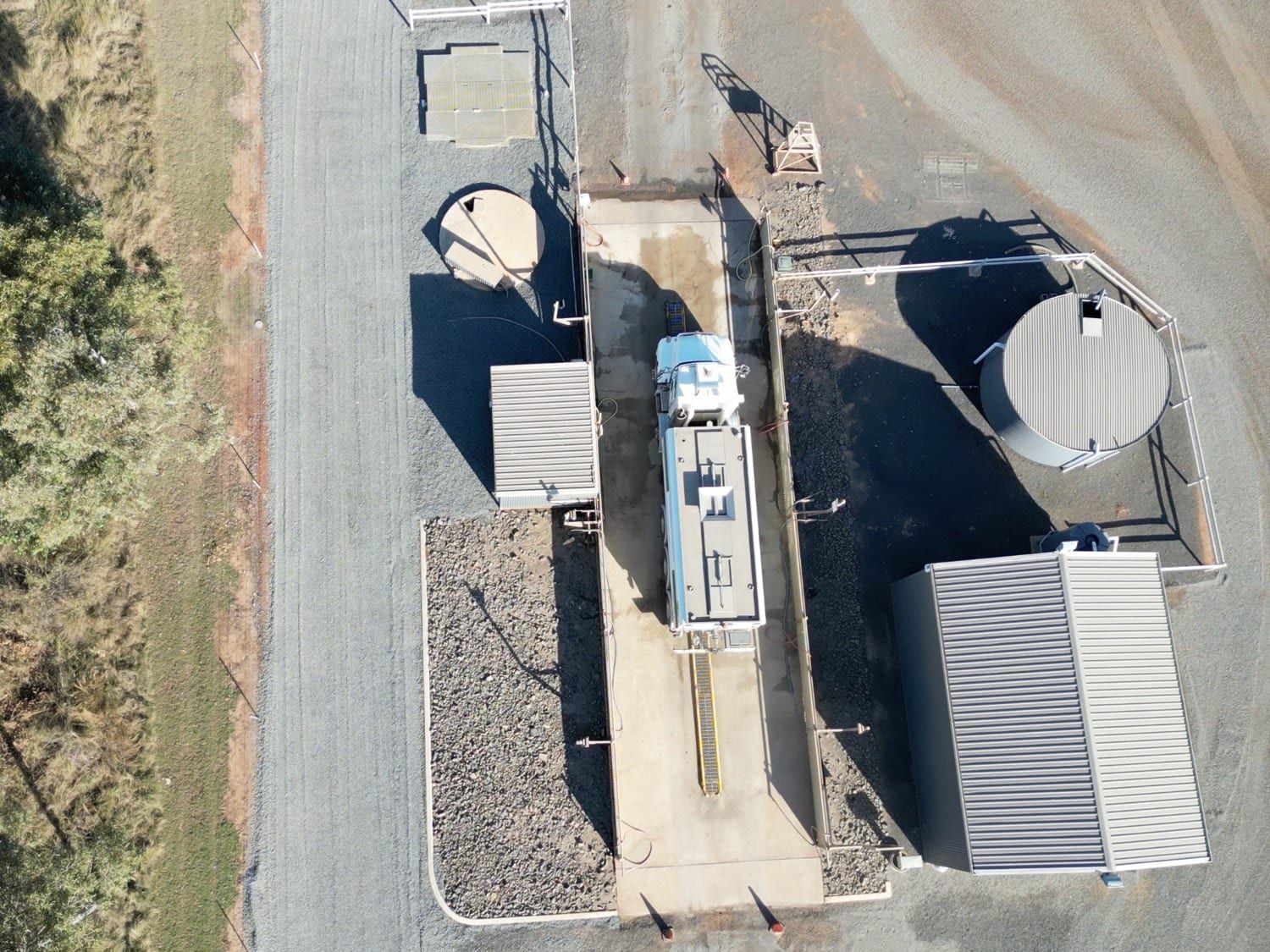an aerial view of a truck in a parking lot