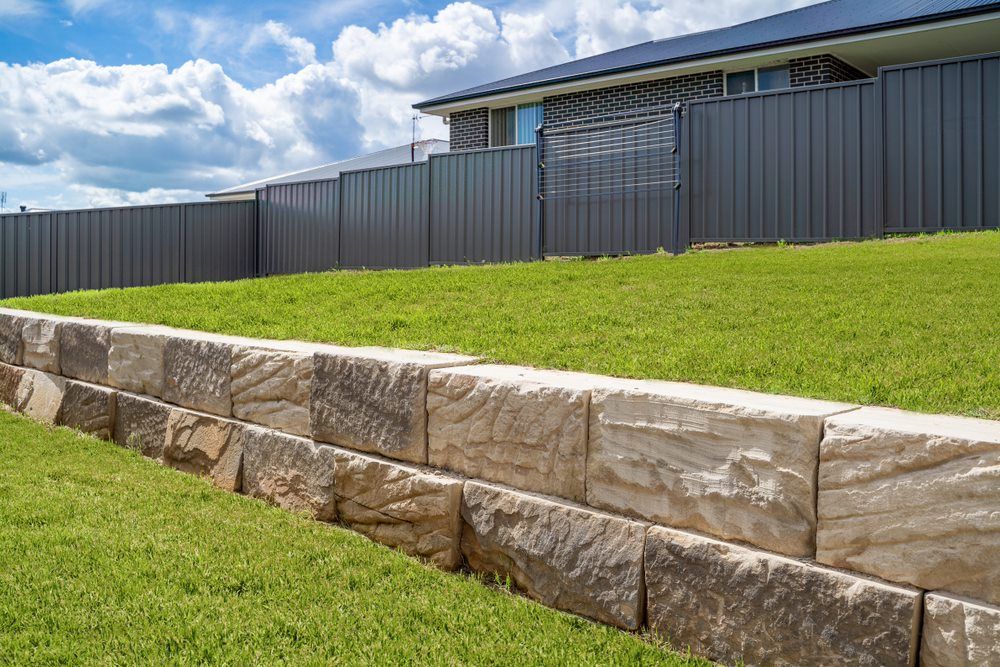 A High Wooden Fence — Property Maintenance & Garden Care in Beerwah, QLD