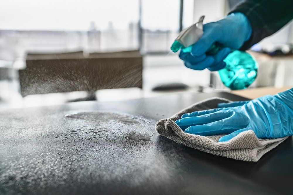 A Table Being Cleaned — Property Maintenance & Garden Care in Beerwah, QLD