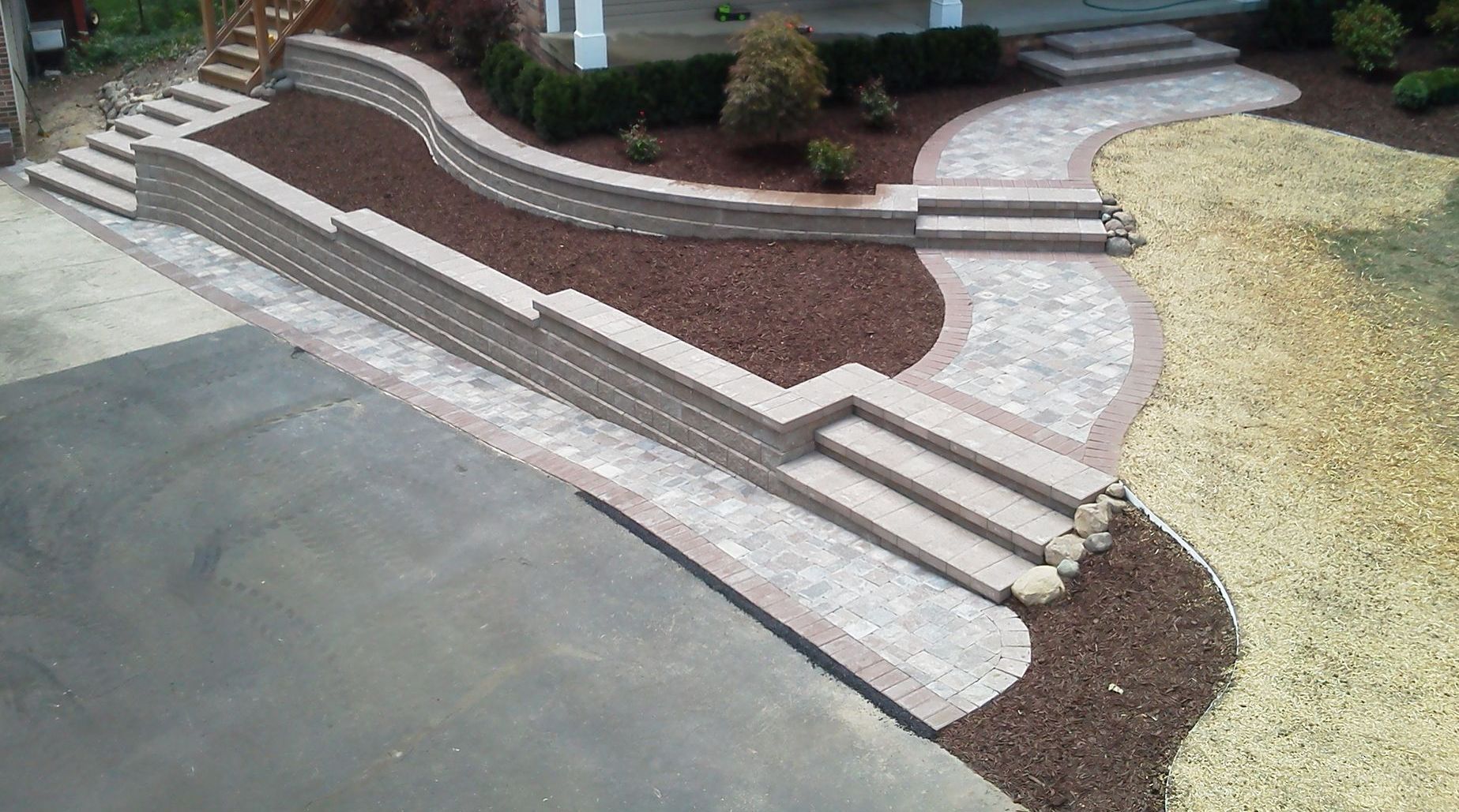 A roll of sod is sitting on top of a pile of dirt. A roll of sod is sitting on top of a pile of dirt.