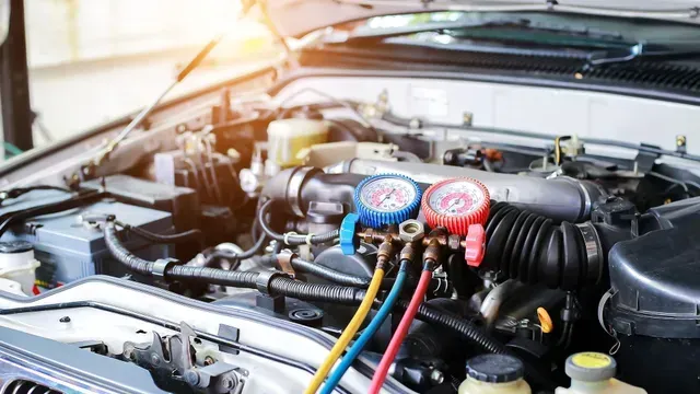 A close up of a car engine with gauges attached to it.