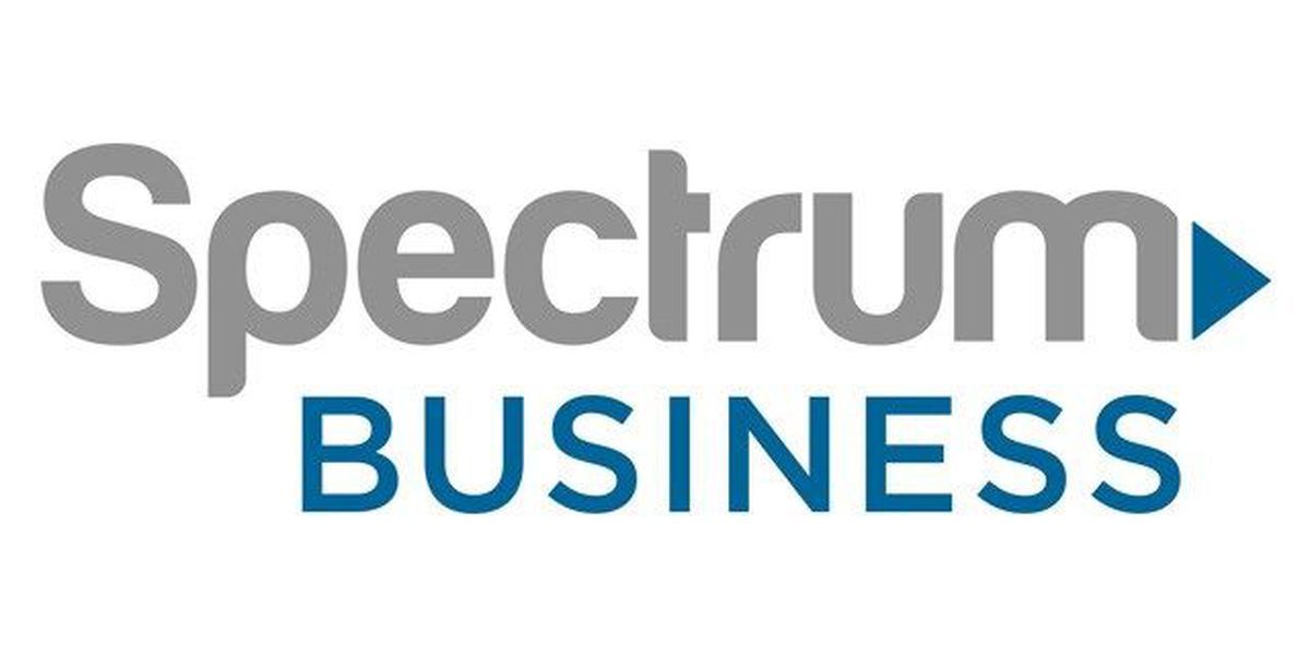 The spectrum business logo is blue and gray on a white background.