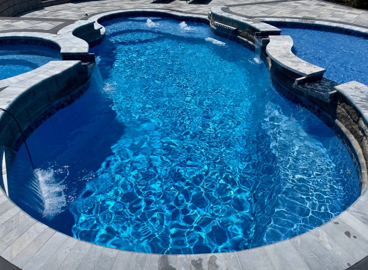 Smooth gel coat surface of a fiberglass pool