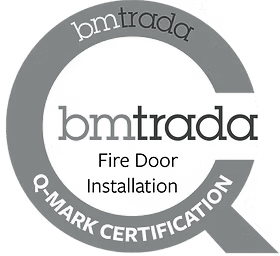Grey Bmtrada Q-Mark Certification logo for Fire Door Installation.