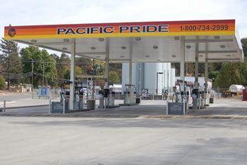 A gas station with a sign that says pacific pride.
