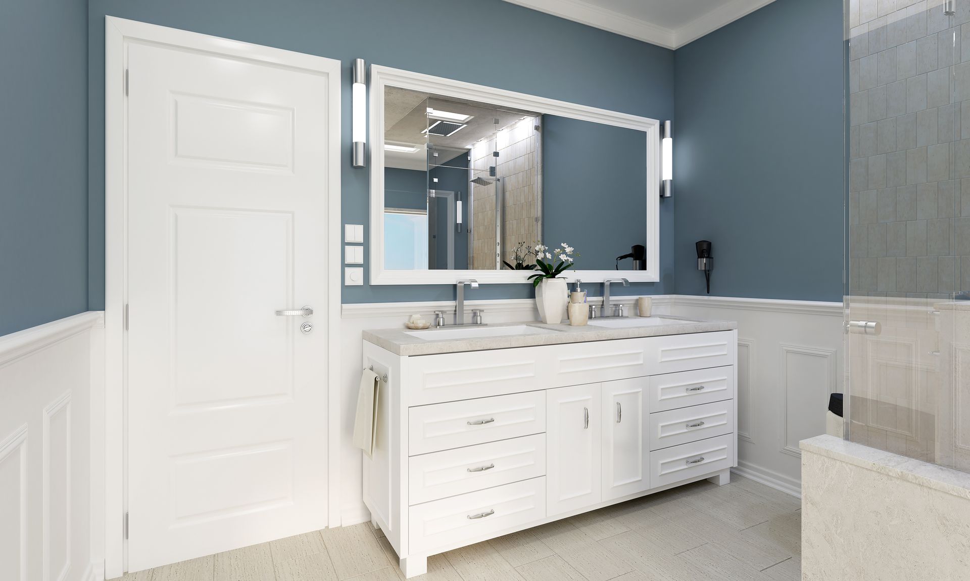 A bathroom with two sinks and a large mirror.