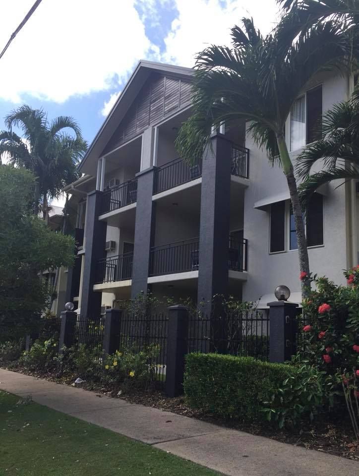 Three-story Apartment Building With Balconies, Dark Pillars — Pete's Painting Solutions In Cairns, QLD
