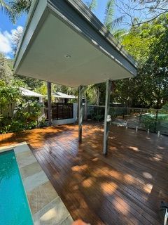 Wooden Deck With a Covered Area, Next to a Pool — Pete's Painting Solutions In Cairns, QLD