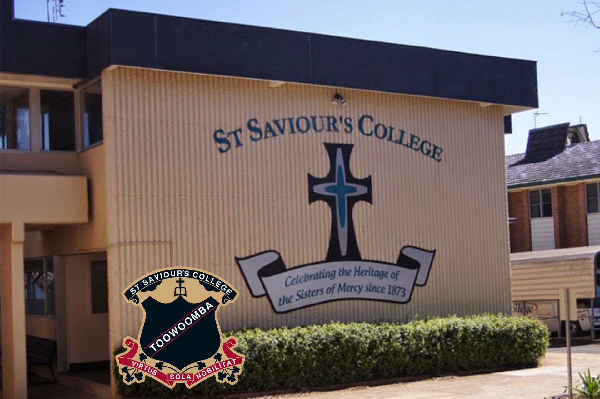 A st saviour 's college building with a cross on the side