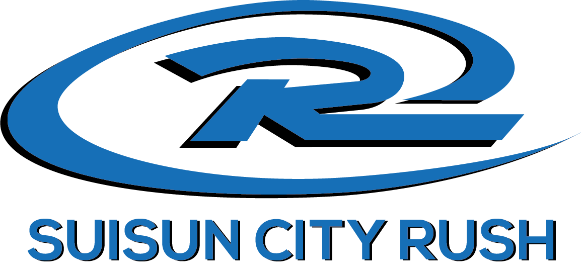 Logo of the Suisun City Rush, featuring a stylized blue "R" within a blue swirl, with "SUISUN CITY RUSH" below.