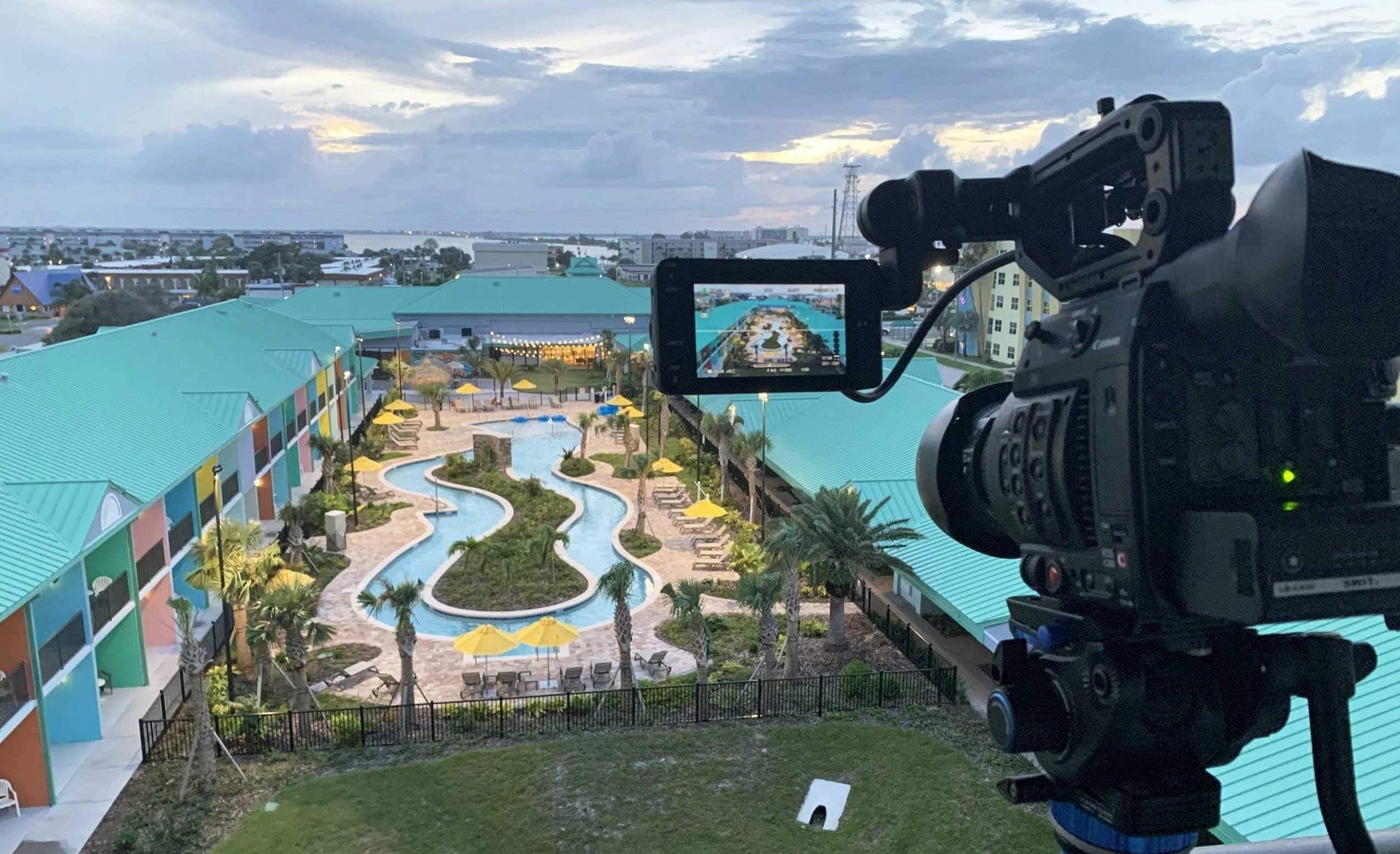 A camera is taking a picture of a swimming pool