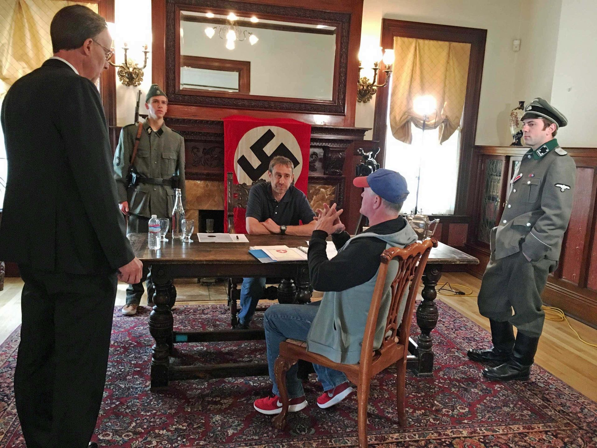 A group of people filing a holocaust documentary