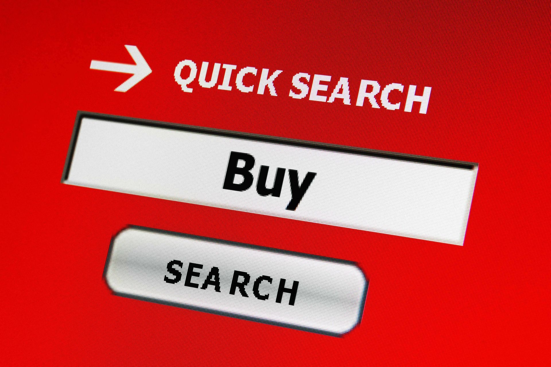 A computer screen shows a quick search button and a buy button