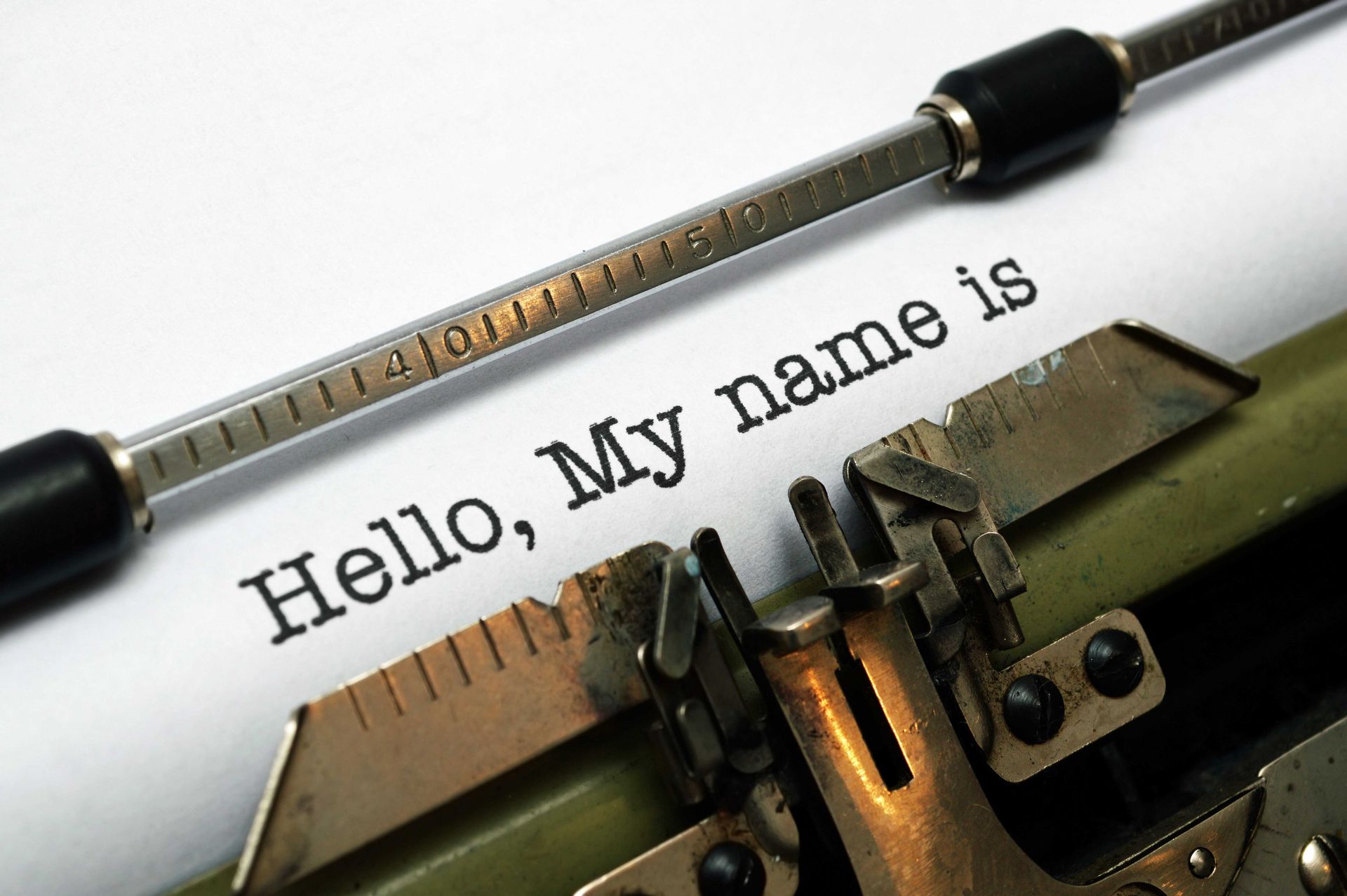 A typewriter with the words hello my name is written on it
