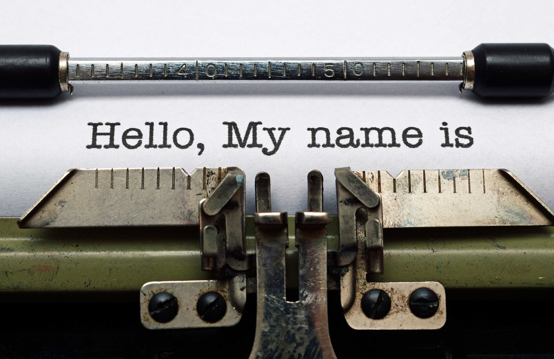 A typewriter with the words hello my name is written on it