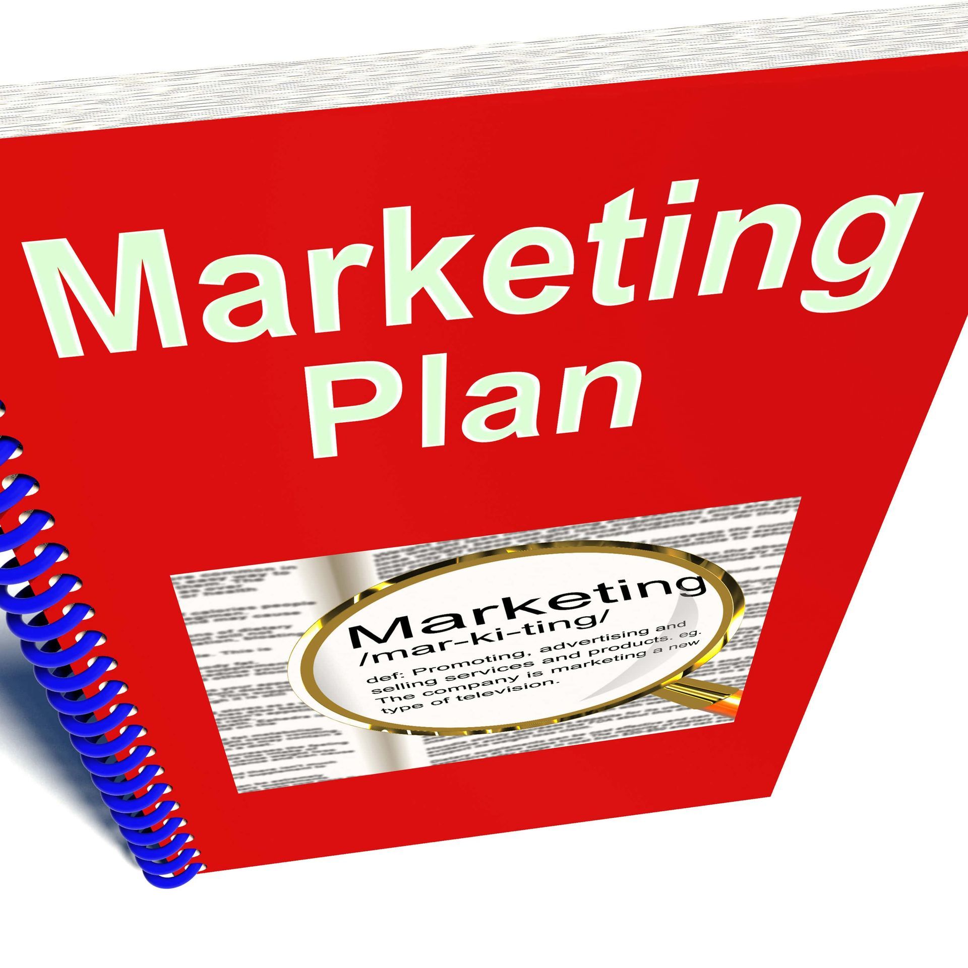 A red book that says marketing plan on it
