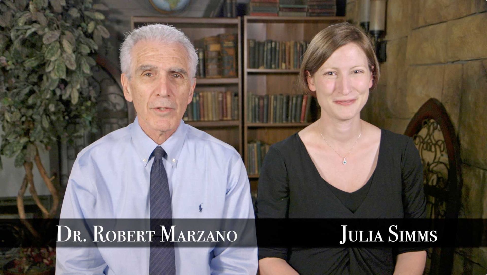 Dr. robert marzano and julia simms are standing next to each other