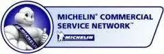 A michelin commercial service network logo with a picture of a man giving a thumbs up.