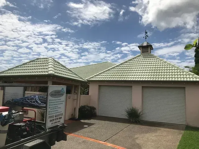 Man Professionally Cleaning the Roof — Complete Pressure Cleaning in Glen Port Macquarie, NSW