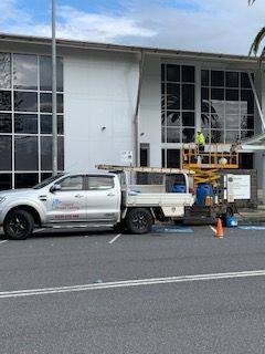 Men Cleaning the Roof of Commercial Establishment — Complete Pressure Cleaning in Glen Port Macquarie, NSW
