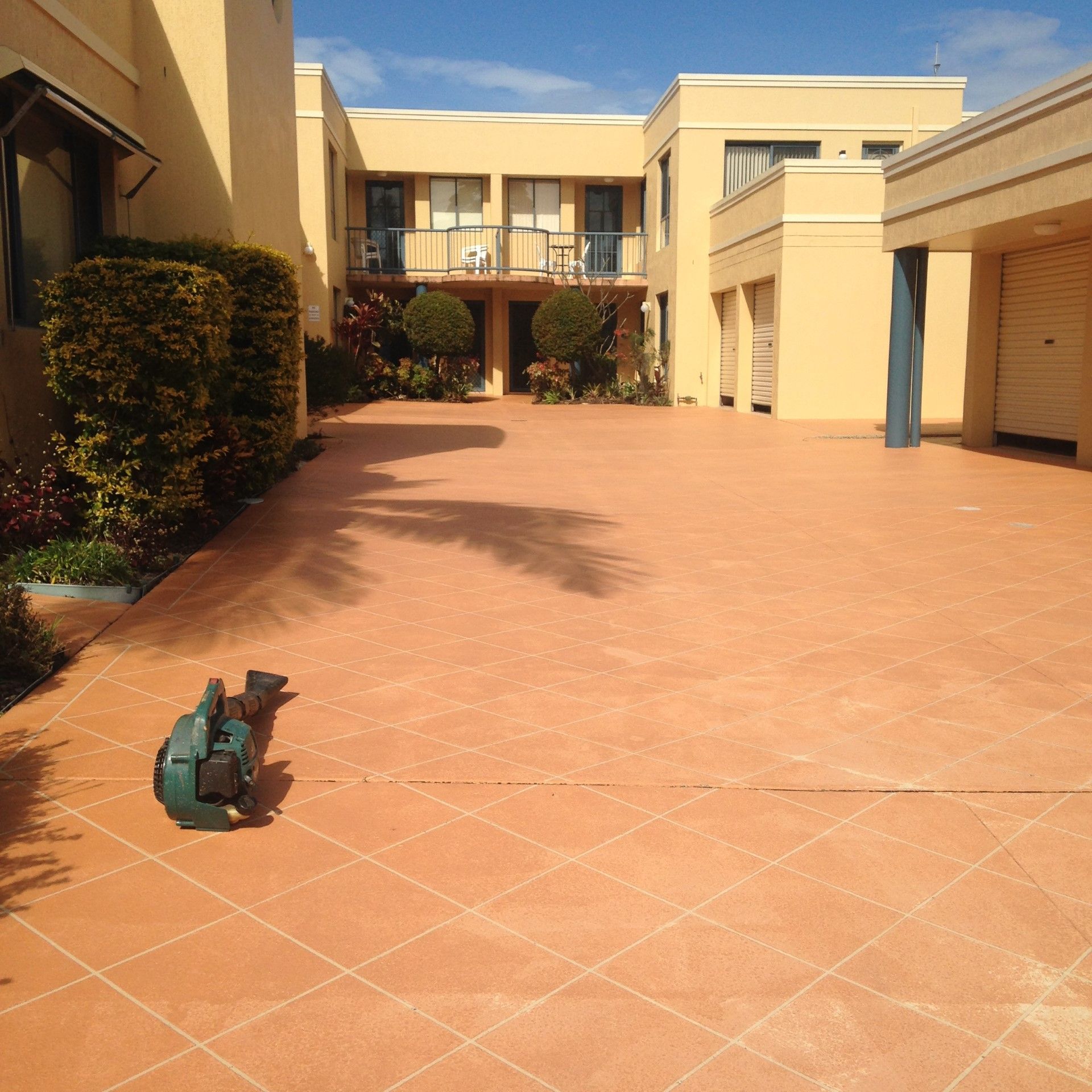 Man Expertly Applying Sealant — Complete Pressure Cleaning in Glen Port Macquarie, NSW