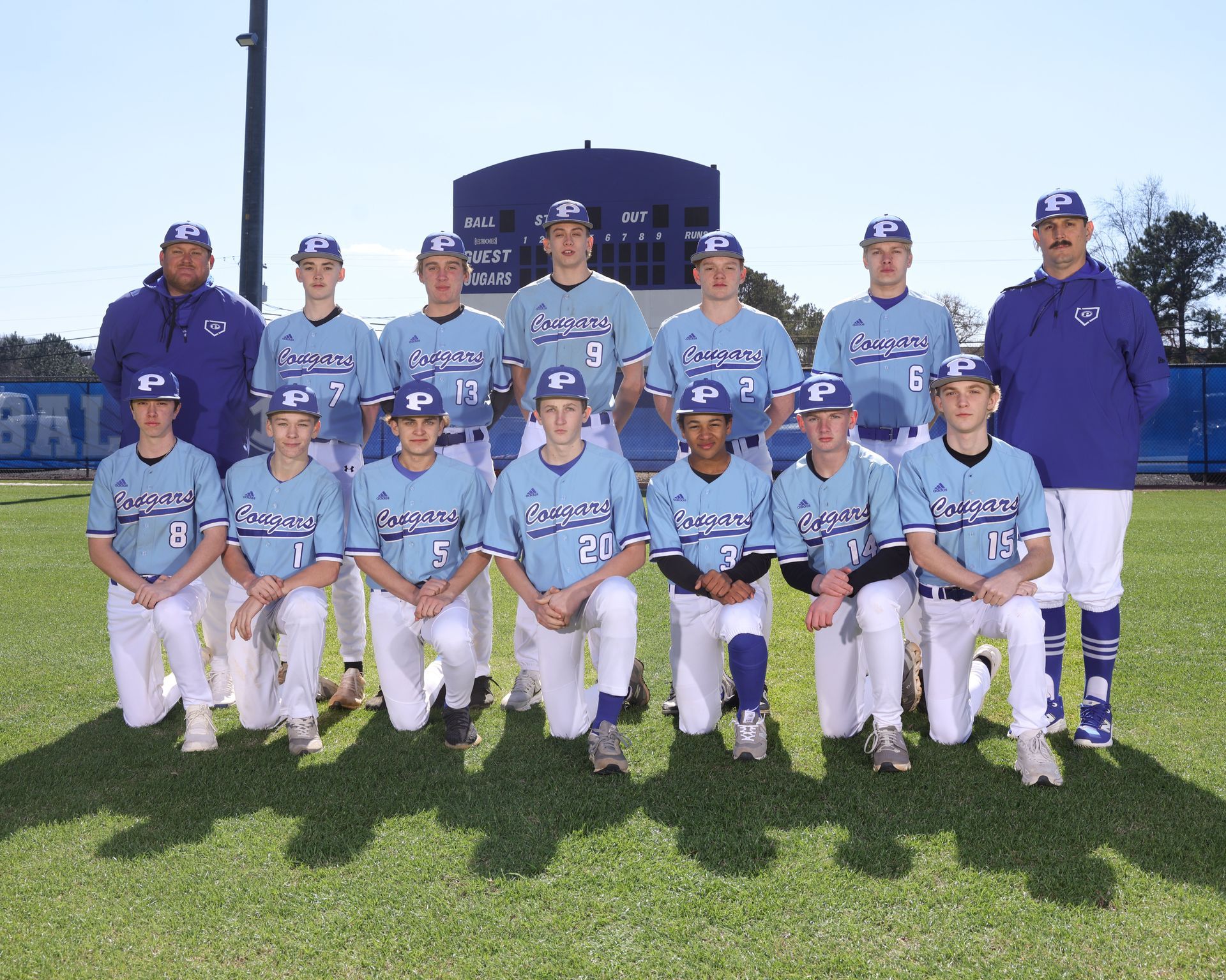 The piedmont academy cougars baseball team is posing for a team photo.