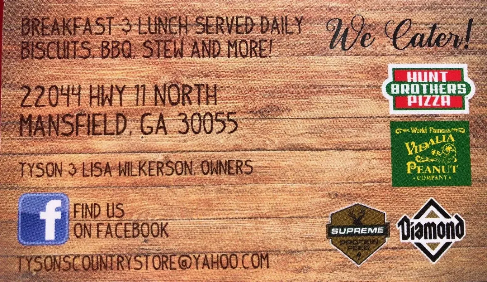 A wooden sign that says ' we cater ' on it