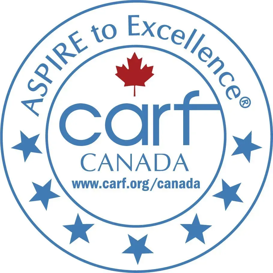 The logo for carf canada has a maple leaf on it
