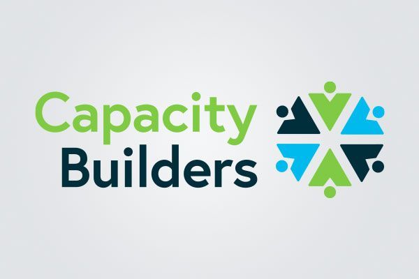A green and blue logo for capacity builders